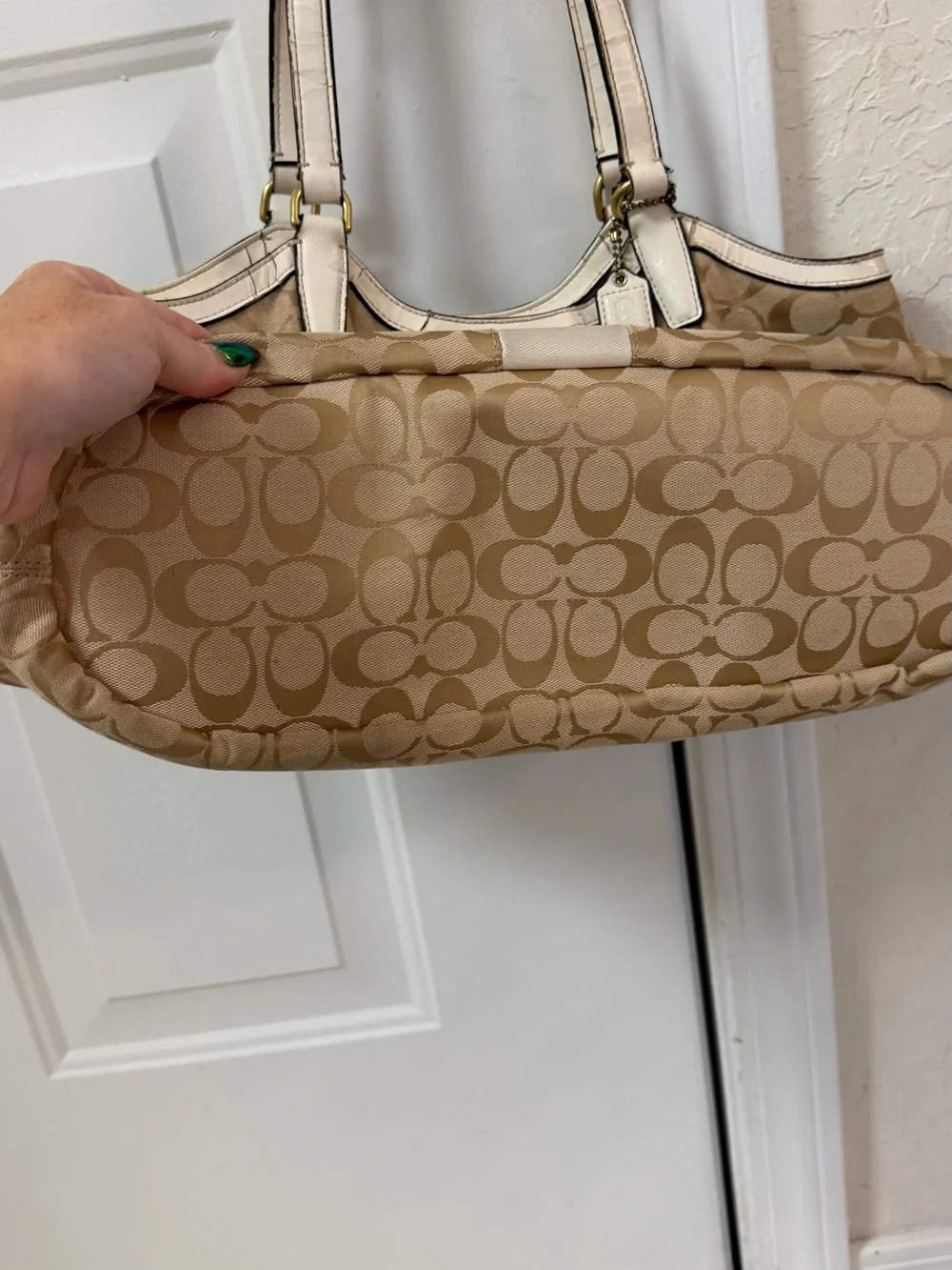 Coach Signature Canvas Beige Tote Bag with Ivory Trim handles are cracked!